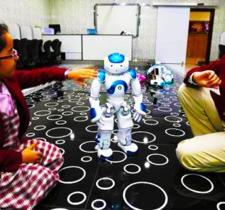 Image showing children learning with a robot at Merryland International School in Abu Dhabi