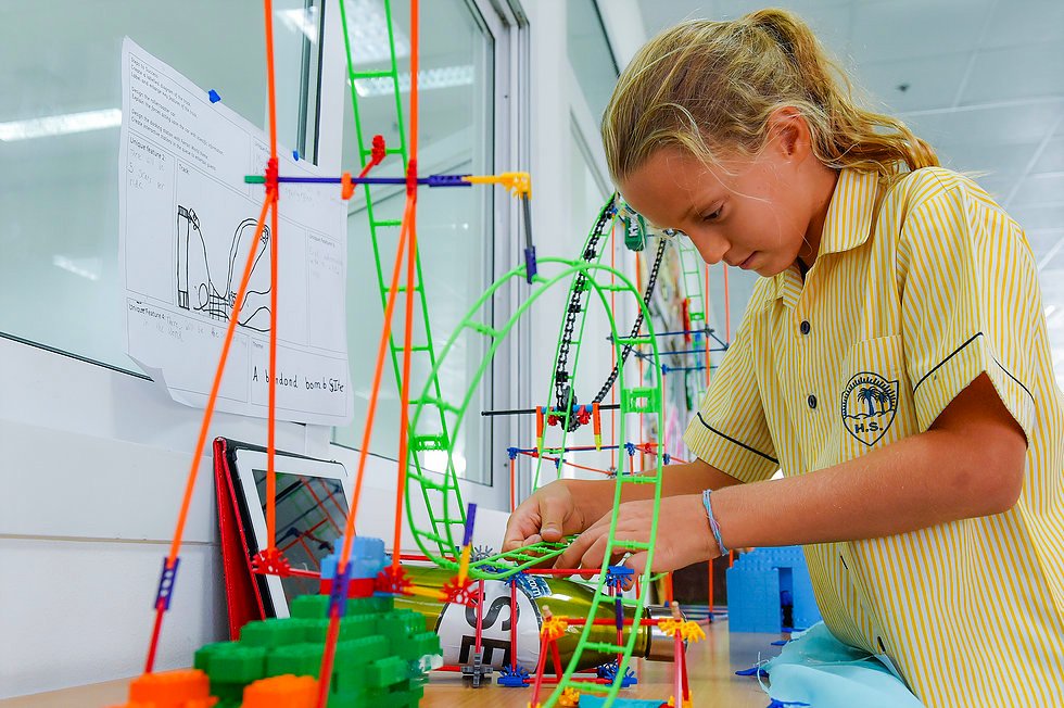 Image showing a student girl experimenting with a construction set at Horizon English School in Dubai - awarded one of the top 20 Best Schools in Dubai and Abu Dhabi by schoolscompared.com in 2017