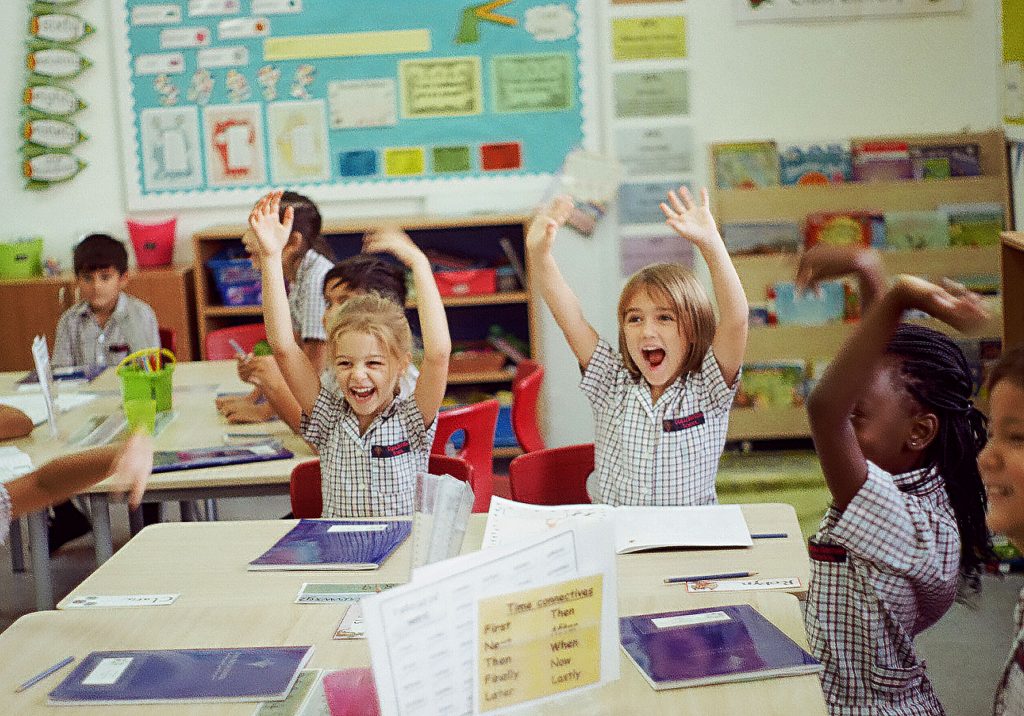 A classroom candid depicts so much enthusiasm. 