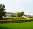 Photograph of Mirdif American School in Dubai showcasing its well kept grounds and attractive place making