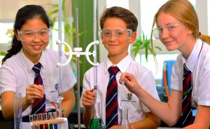 Photograph of younger children at Brighton College Abu Dhabi engaging in a Science experiment