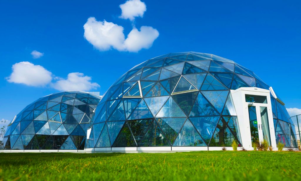 Photograpg of two geodesic biodomes at the Arbor School in Dubai highlighting the self-contained bio diversity that the school can create in learning zones for children