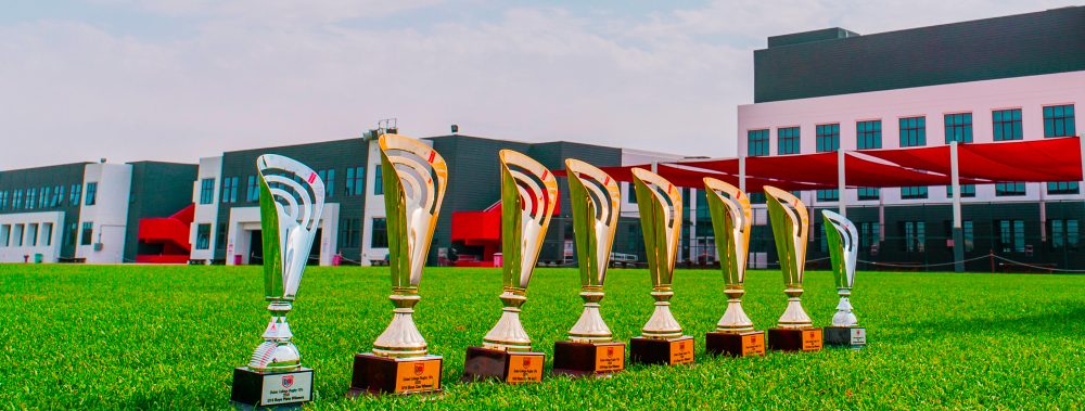 Rugby giants Dubi English Speaking College DESC in Dubai Clean Sweep 2020 - a photograph of the trophies in the DESC grounds