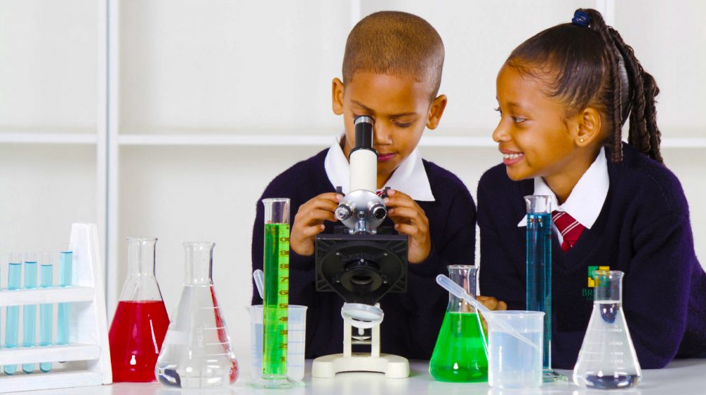 Children at Bright Learners School in Dubai conducting Science experiments in the lab.