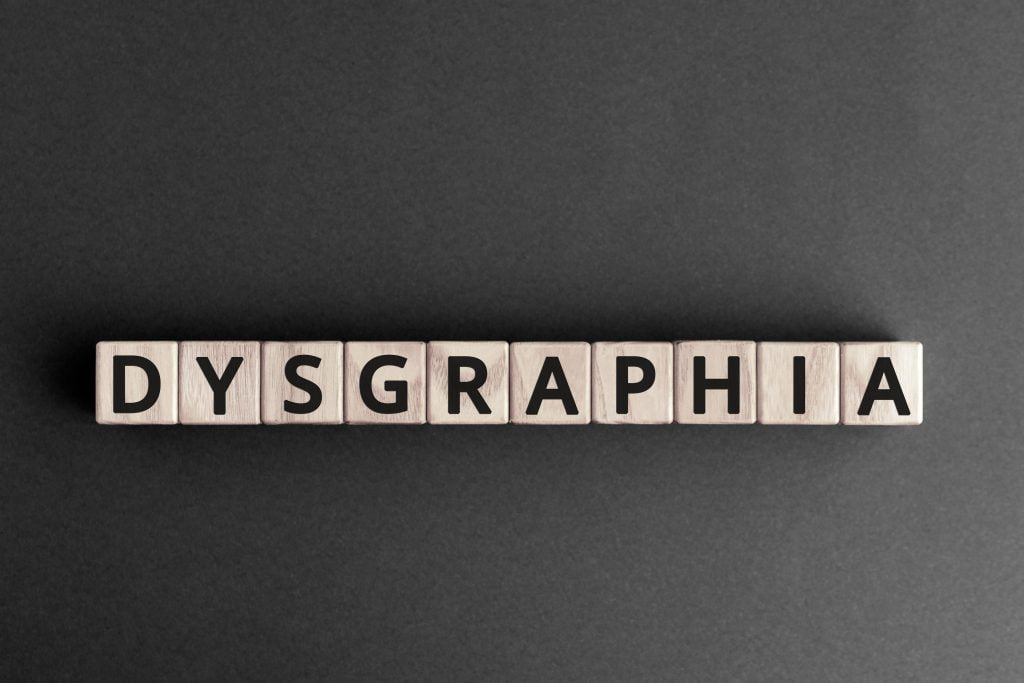 Dysgraphia - word from wooden blocks