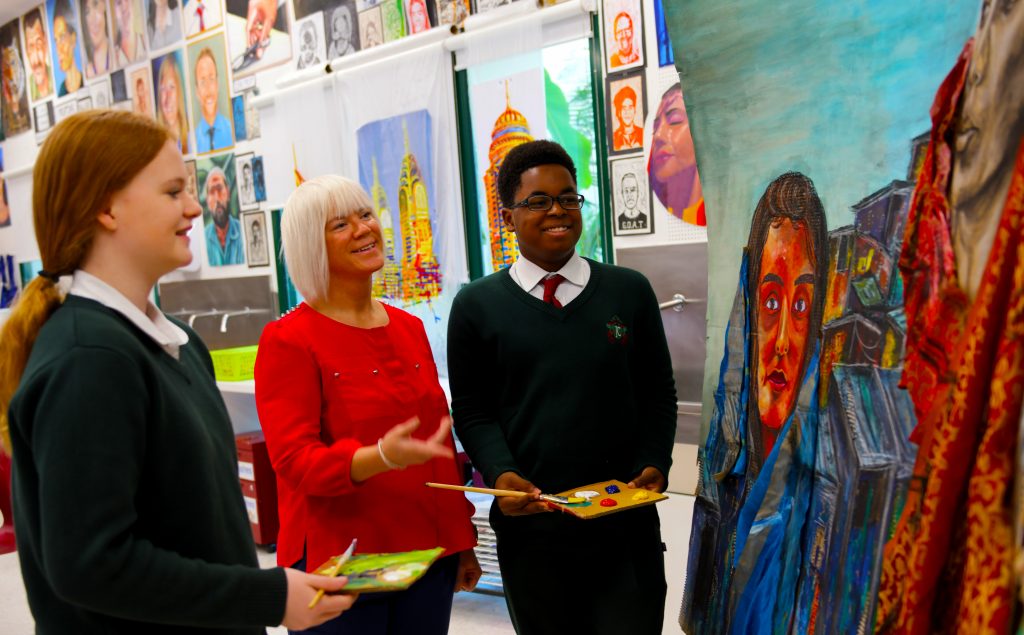 Students, parents and teachers admiring art produced by students across, oils, acrylics and water colour as part of a landmark Exhibition at GEMS Jumeirah College in Dubai