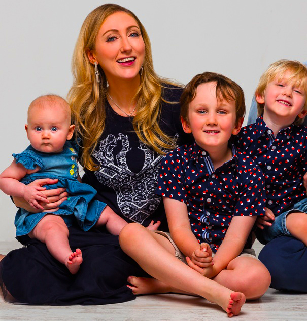 Photograph of award-winning journalist Tabitha Barda with her family as she joins SchoolsCompared as Senior Editor with a remit to help parents across the UAE make sense of educational choices for children.