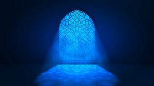 Moon light shining through a mosque's windows as the Eid holidays start