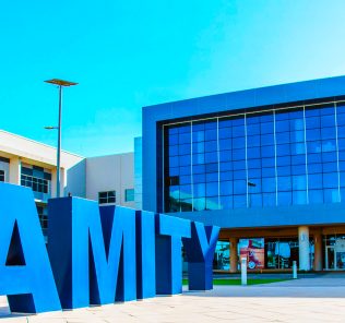 Photograph showing Amity International School Abu Dhabi main building frontage and entrance